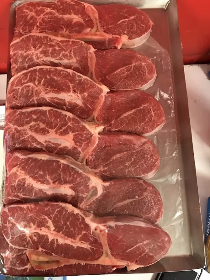 Butcher preparing lamb